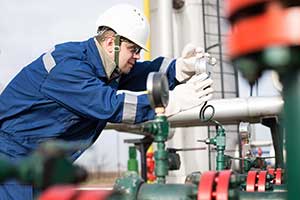 A man checking up on Gas safety of the houses