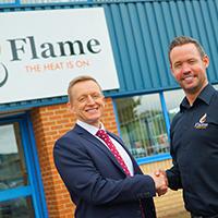 Managers of Flame and HSBC outside Flame Heating Offices