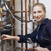 Female plumbing employee - health & safety