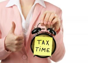 woman in pink suit holding ala