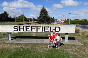 Last years winner of the PolyMax prize next to a Sheffield sign