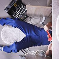 Plumber under sink - British plumbers can almost double their salaries in Germany Plumber under sink - British plumbers can almost double their salaries in Germany