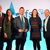 Flame Heating Group Staff With Award Flame Heating Group Staff With Award