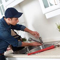 self-employed plumber fixing sink self-employed plumber fixing sink